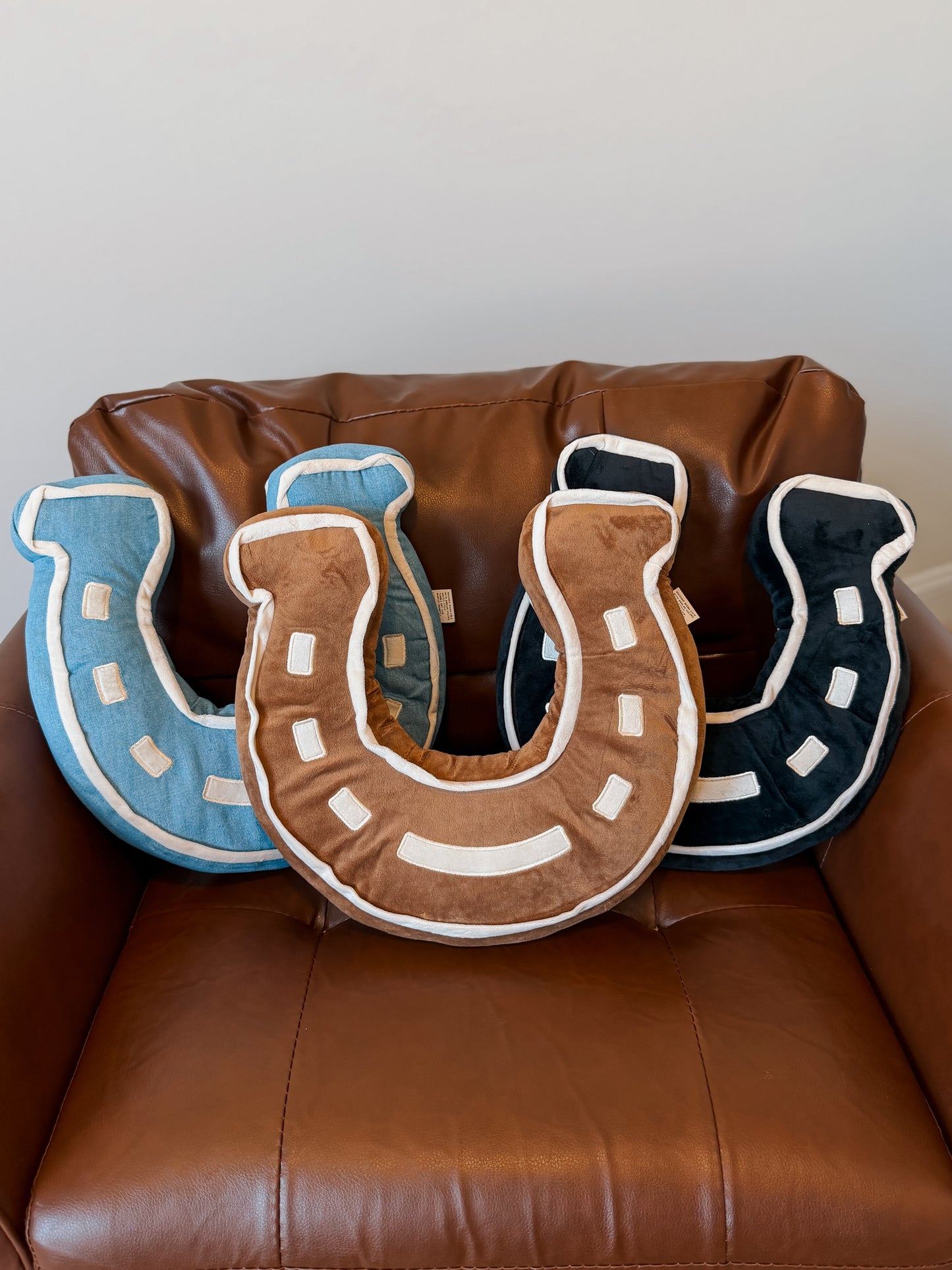 Lucky U Pillow | Saddle