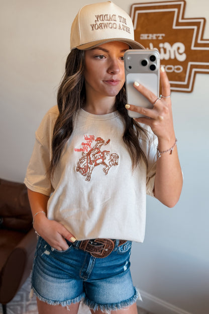 Cream oversized t-shirt with ‘Hold Your Horses’ embroidered in pink on the front