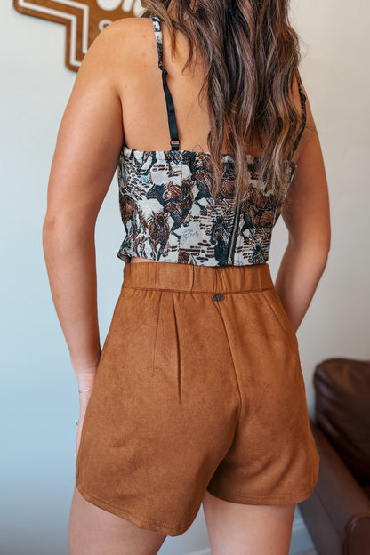 Camel suede skort with shorts in the back.