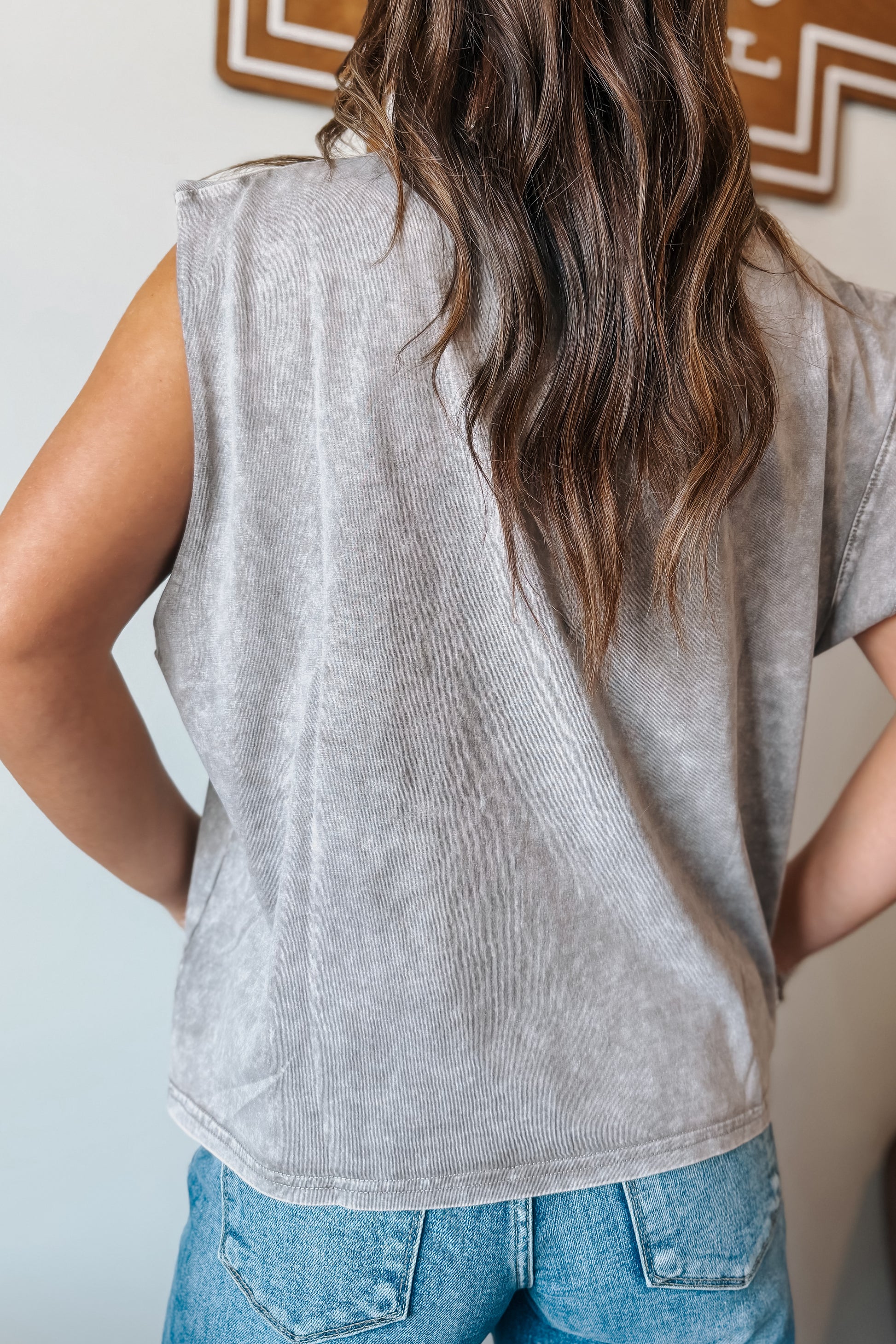 Back view of gray mineral wash muscle tank top.