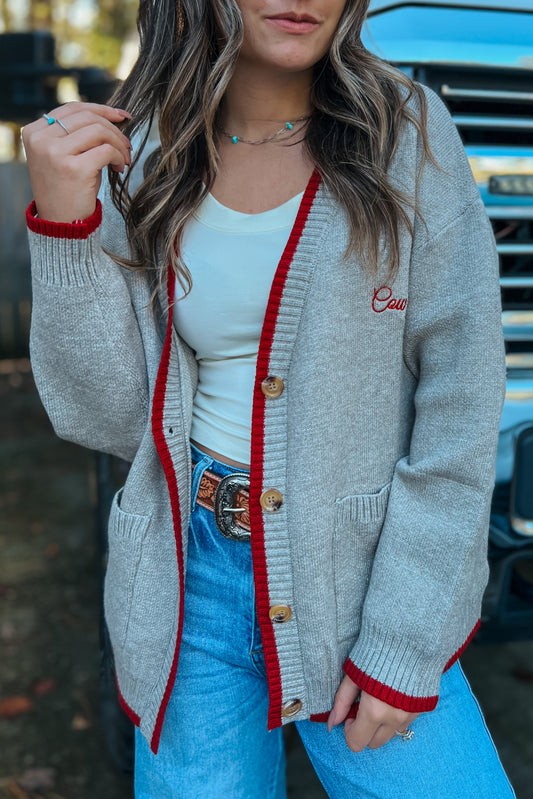 Grey Found My Cowboy embroidered knit cardigan styled with jeans and boots
