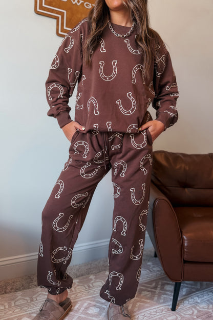 Brown jogger set with white horseshoe print, long-sleeve sweatshirt and matching jogger pants.