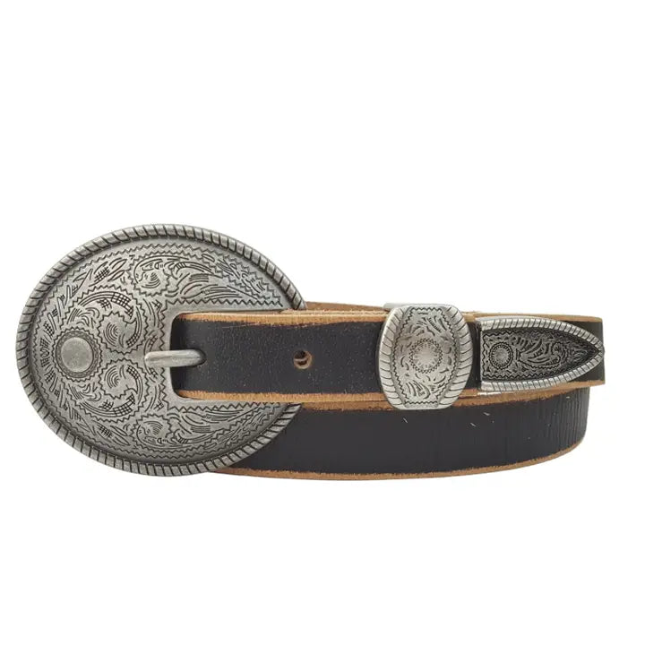 Close-up of a black engraved western belt worn with blue denim jeans.