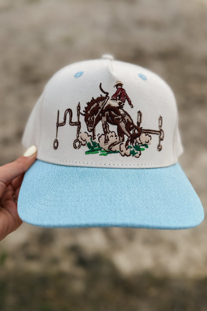 Snapback with a horse and rider design. 