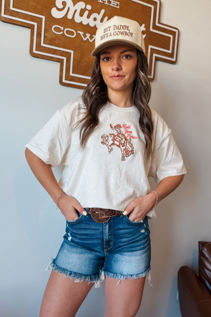 Cream oversized t-shirt with ‘Hold Your Horses’ embroidered in pink on the front Styles with denim shorts