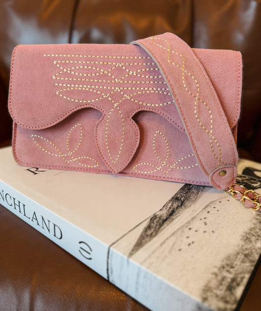Light pink suede boot stitch clutch bag. 