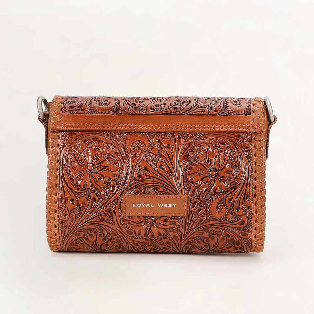 Brown hand-tooled leather crossbody bag with floral carving, whipstitch trim, and silver clasp closure