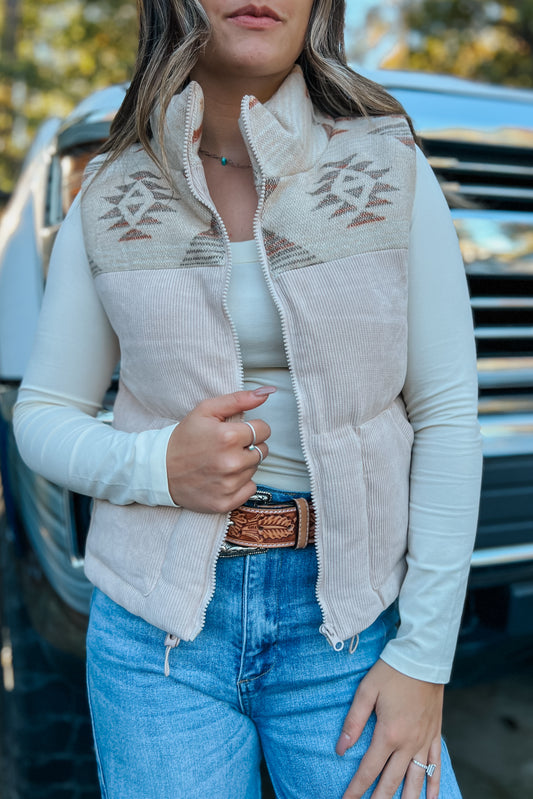 Western corduroy puffer vest with Aztec print and zip-up front