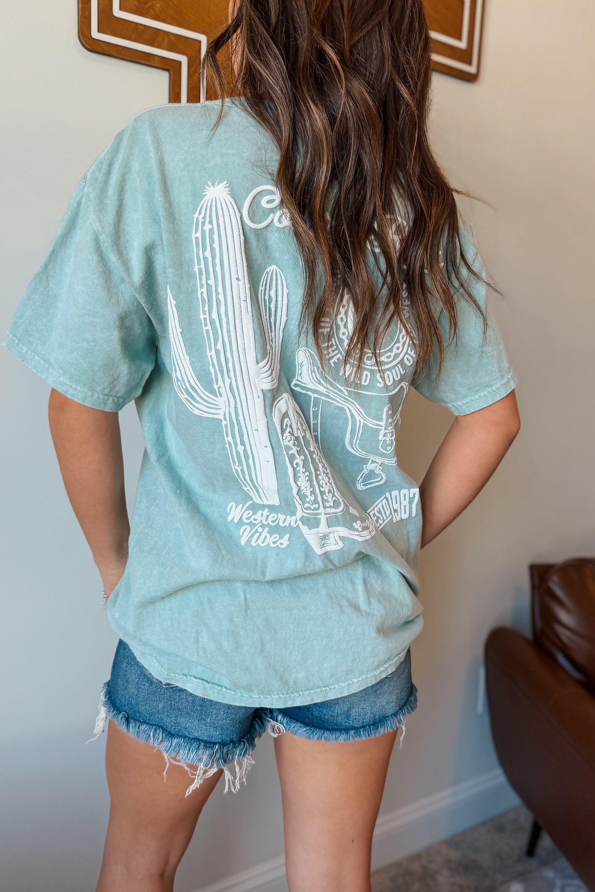 Back view seafoam green western collage puff print graphic tee