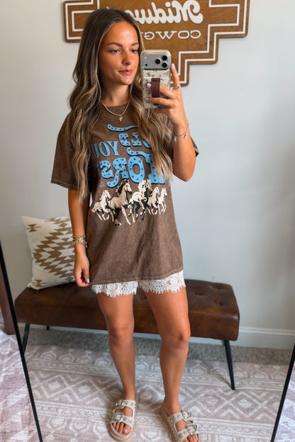 brown graphic tee featuring a "Hold Your Horses" design on the front.