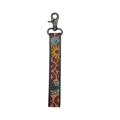Western leather keychain wristlet with embroidered leopard, sunflower, and cactus design.