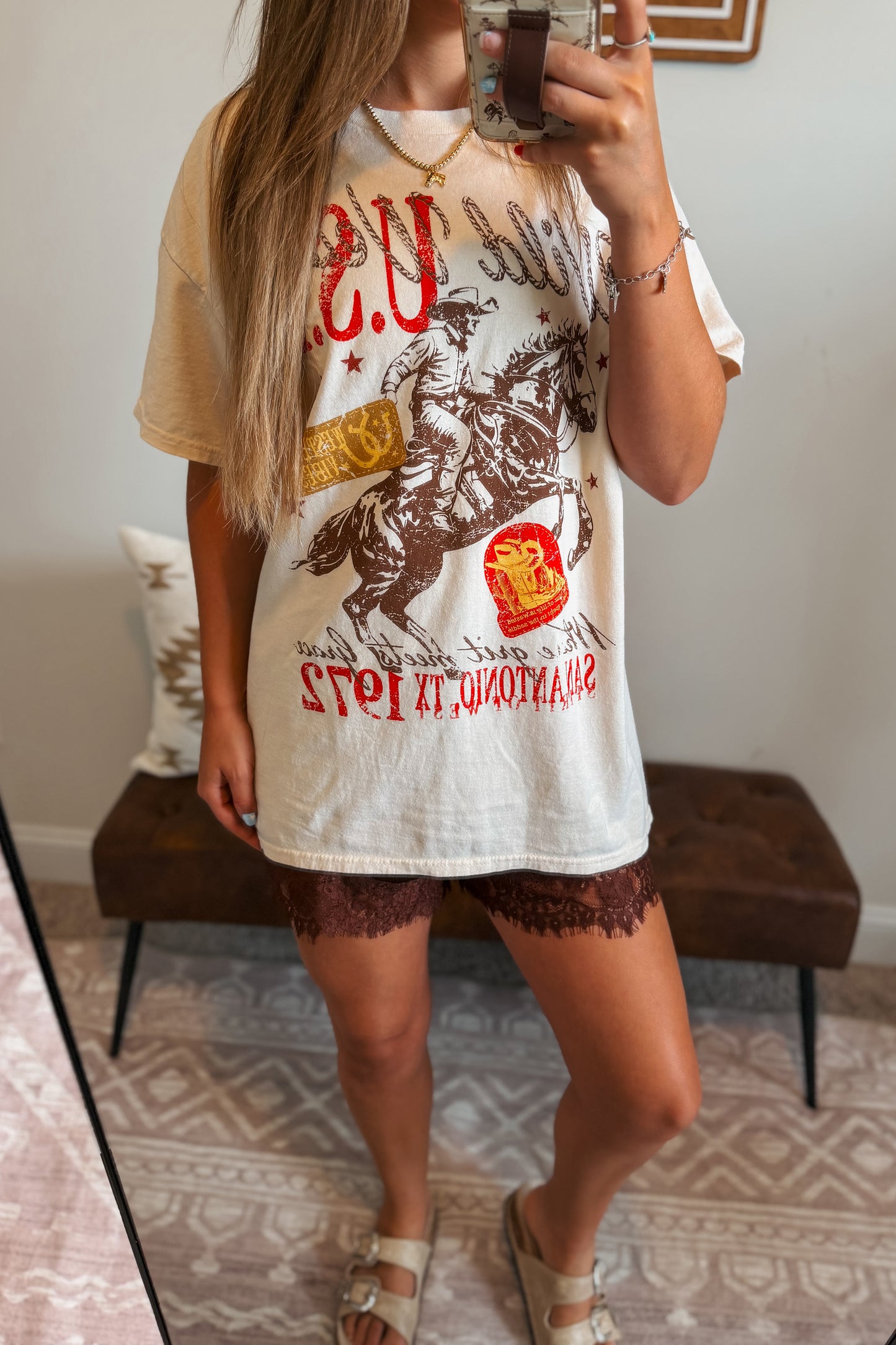 Front view of oversized Western graphic tee featuring a bold western-inspired design.