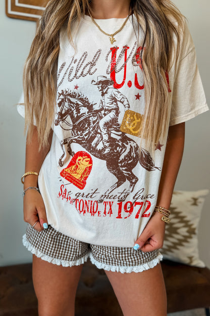 Front view of oversized Western graphic tee featuring a bold western-inspired design.